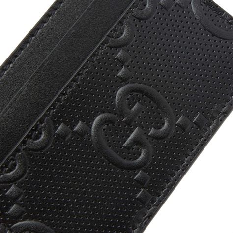 gucci embossed logo leather black card holder|Gucci card holder with keychain.